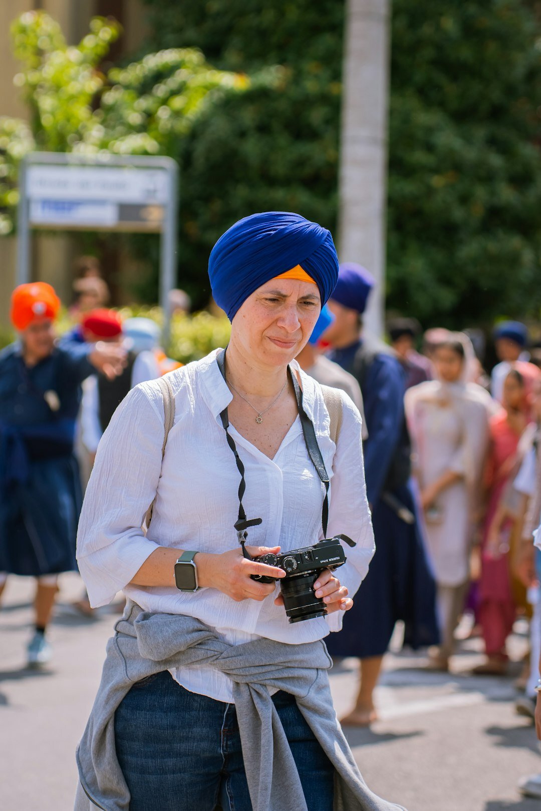 Photographer documenting a local community event
